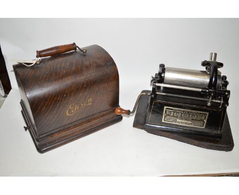 An Edison gem cylindrical record player in oak case, serial no. G188365 (no horn).
