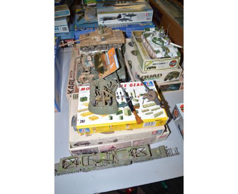 A collection of made and unmade models of various military vehicles, including: Hasegawa 172 scale Leopold tank; a German Kar