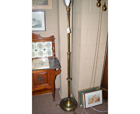An early 20th Century lacquered brass extending lamp standard.