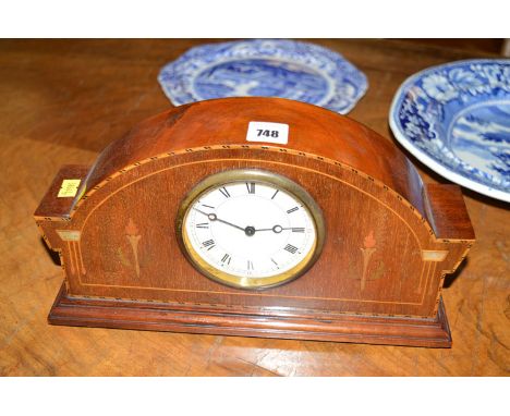 An Edwardian inlaid mahogany mantel clock, fitted white enamel roman dial.