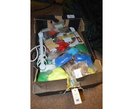 A quantity of fly tying equipment, an Angle poise lamp, fly tying vice, bags of feathers etc.