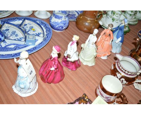 Six Royal Worcester figurines of ladies: "Charity", "Autumn Song", "Fragrance", "Winter Waltz", "Grandmother's Dress" and "Su