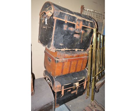 Two leather cloth domed trunks; together with a tin trunk.