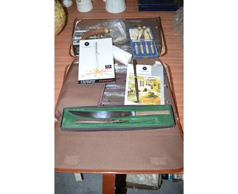 A cased Waltmann Und Sohn nine-piece knife set; a Viners Studio carving knife and fork; etc. 