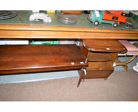 A reproduction mahogany coffee table; a stained walnut canterbury; and a gold painted dressing table stool. (3)