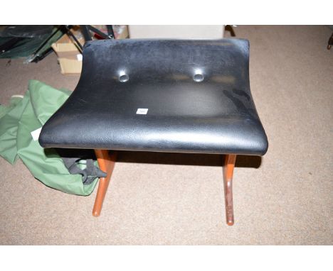 A black vinyl seated modern teak stool.