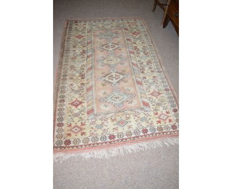 A modern Persian carpet of Melas type, with diamond floral pattern medallions to central field, 78 x 49in. 