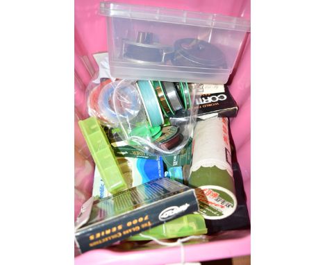 An aluminum fly fishing reel: a condex trout fly fishing reel: and a box containing various fishing lines: floating and sinki