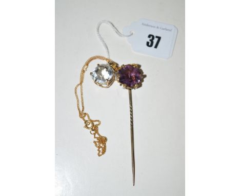 A rock crystal set pendant in yellow metal mount, on chain; together with an amethyst tie pin.  (2)
