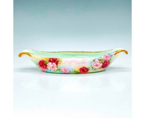 Beautiful porcelain elongated dish with handle ends finished with light green interior and hand painted rose exterior, embell