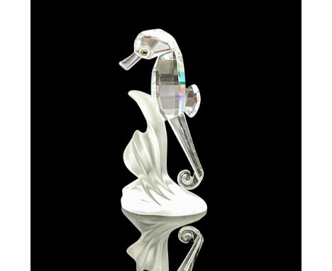 Part of the 'South Sea' collection and 'Aquatic Worlds' theme. Clear faceted body with blue eyes, attached to a frosted base.