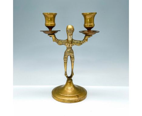 Vintage brass double candelabra with a bearded male figure stem, two candle cups, drip tray, and a single round base. Dimensi