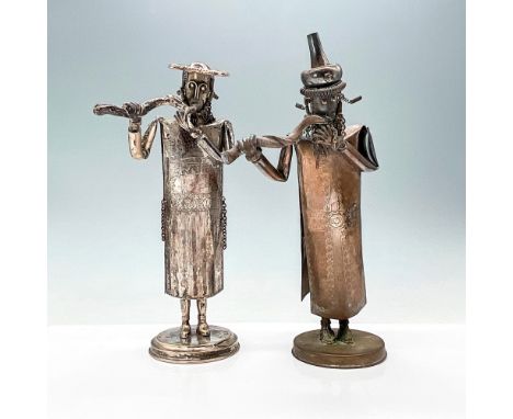 Two original hand-made figurines of Jewish men playing musical instruments. A spring hidden inside allows the figurines to mo