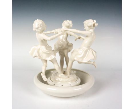 The Hutschenreuther porcelain figural group and flower bowl, titled Ring Around the Rosy, showcases three girls merrily playi