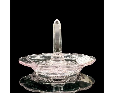 Oval glass ring dish with slight violet tint in a floral shape with scalloped edge. Dimensions: 3.25"L x 2.75"W x 3.5"HCondit