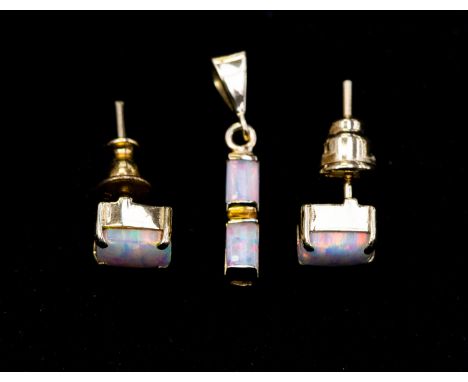 14 ct marked 585 pair of opal stud earrings and backs, together with a matching opal drop pendant, total gross weight approx 