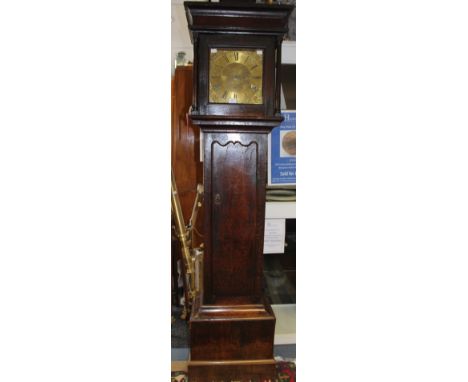 A mid 18th Century 30 hour oak long case clock, the brass dial inscribed 'Henry Payton', Bromsgrove, the hood with a caddy to