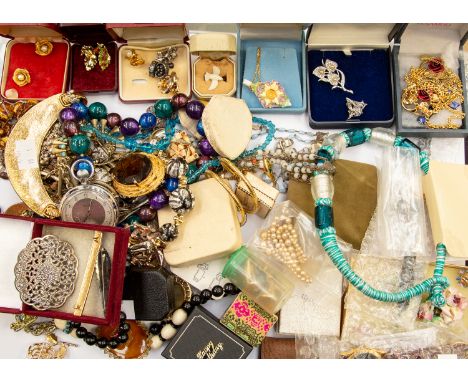 A collection of costume jewellery comprising silver clog earrings, vintage beads, paste set jewellery, Siamese jewellery, gil