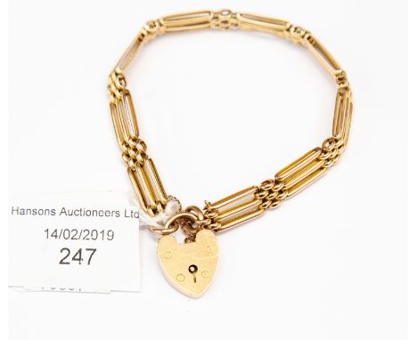 A 9 ct gold gate bracelet, three bar, padlock clasp, total gross weight approx 15.4 grams