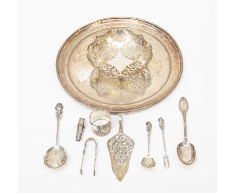 Collection of white metal items to include pierced bonbon dish, pickle fork, two spoons marked 800, also a hammered silver co