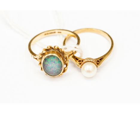 2 9 ct gold dress rings, one containing a cultured pearl the other an opal doublet 