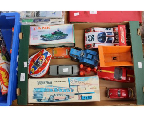 Box of assorted vintage toys including tinplate battery operated Big Machine racing car, Triang, tractor with trailer, tinpla
