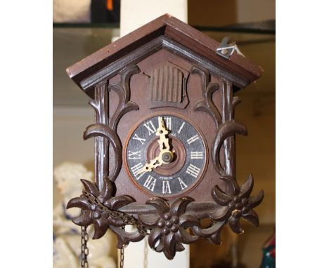 A 20th Century small sized wall hanging cuckoo clock 
