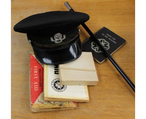 St John's Ambulance hat, swagger stick, badges and books - including first aid books dated 1925 &amp; 1928; cadet badges, but