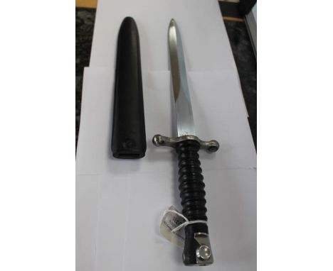 Swiss SIG Stgw 1957 pattern bayonet and scabbard. Modified crossguard to make it into a fighting knife. 24cm long double edge