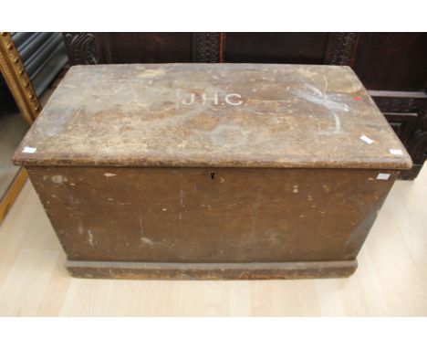 A 19th Century pine travelling trunk, complete with internal candlebox, the top initialled reading 'JHC', complete with vario