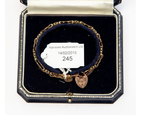 A 9ct gold gate link bracelet with locket clasp