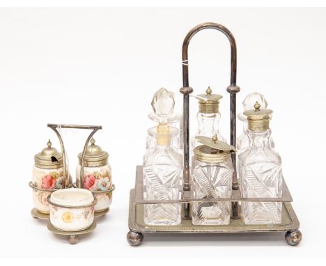 A Sheffield plate cruet stand on ball feet with six condiment bottles together with another cruet stand with ceramic bottles 