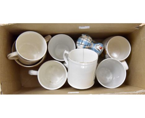 Collection of commemorative / Coronation ware mugs including an Edward VII example, together with a ceramic dog