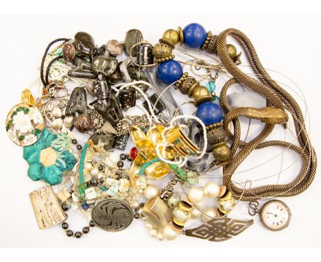 A collection of costume jewellery to include silver pendants, brooches and a amber set bracelet, a ladies enamel faced pocket