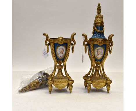 Pair of French 19th Century Ormalu twin handled garnitures and covers with blue porcelain panels decorated with a female port