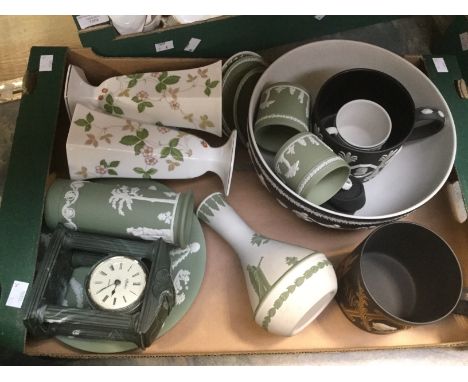 Wedgwood black basalt jasperware, two tankards, large fruit/punch bowl, together with pale green jasperware plates, cups, sau