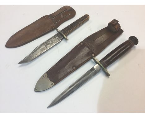 Pair of Hunting knives: one by "Wn Needham, Hill St, Sheffield" double edged 14cm long blade. Compressed leather washer type 