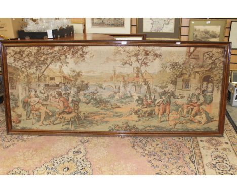 A large Continental machine made tapestry panel depicting village scene with figures 