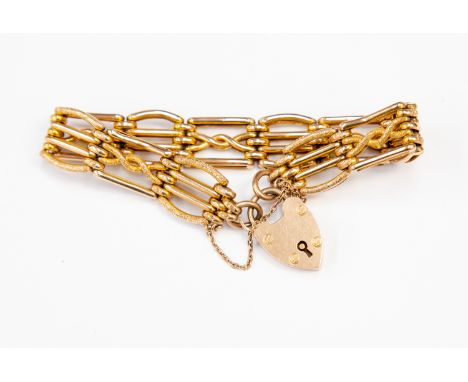 A 9ct gold gate bracelet, alternate textured and polished details,  padlock clasp, weight approx 22gms