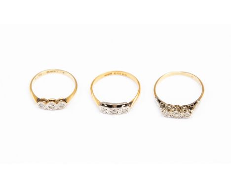 Three diamond and 18ct gold rings, each ring set with three diamonds, sizes K, M1/2 and N, combined total gross weight approx