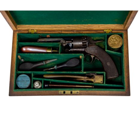 A cased Webleys Patent Longspur Percussion cap revolver. 4 inch barrel. 6 shot with each chamber numbered. Long spur hammer. 