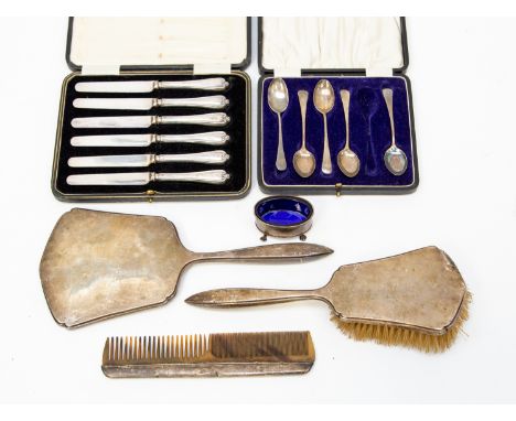 A collection of silver including silver - mounted hair brush, comb and mirror, fruit knives, teaspoon and mustard pot, variou