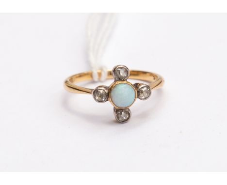 An 18ct gold opal and diamond, round opal set to the centre, with a cross design of collet set old cut diamonds, 18ct gold mo