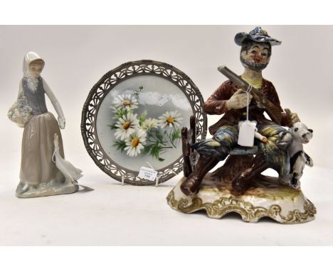 A Nao Goose girl figure, a Capodimonte figurine, a German plaque with metal surround (3)