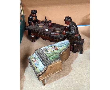 A 'grand piano' musical box with Dresden style ceramic panels; a carved wood music box:&nbsp; old couple eating at a table 