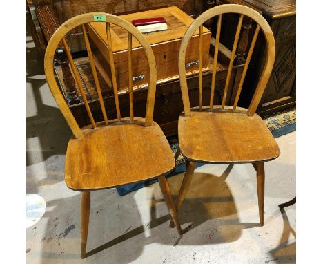 A set of Ercol style elm and beech hoop and stick back chairs 