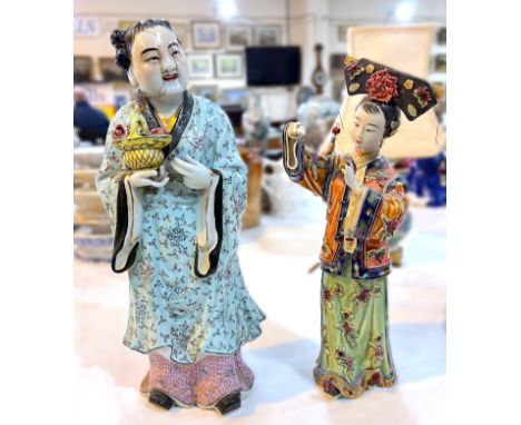 Two ceramic Chinese figures of women&nbsp; 