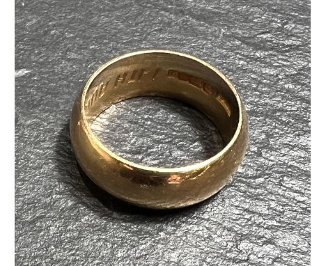 A 22ct hallmarked gold 'D' shaped wedding ring, size J, 7.5gms 