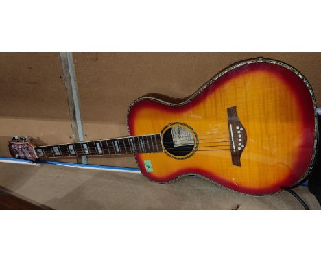 A TANGLEWOOD acoustic/electric guitar with rounded back, model TMO-15P 