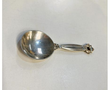 A Georg Jensen Scandinavian caddy spoon, stamped to reverse